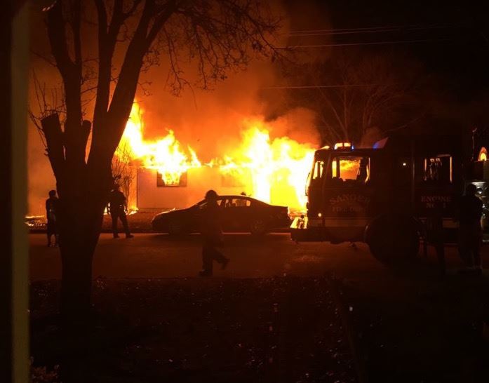 Fire Department Responding to a House Fire